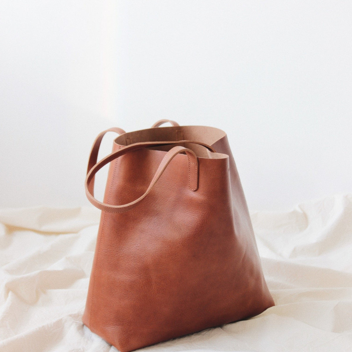 Soft brown leather tote on sale
